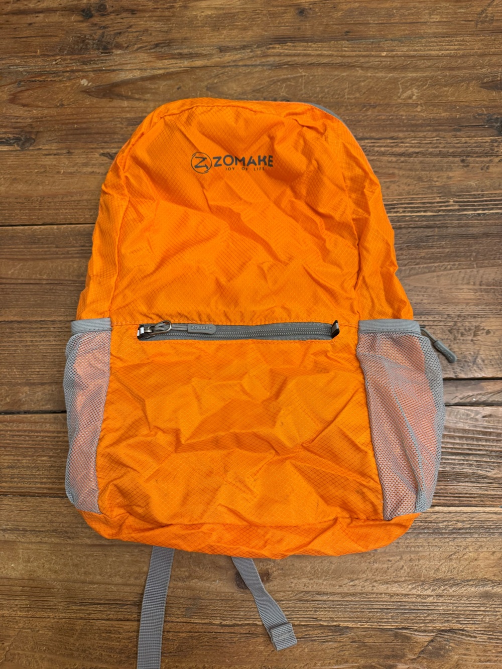 A33 -Compact Orange Packable Men's Backpack